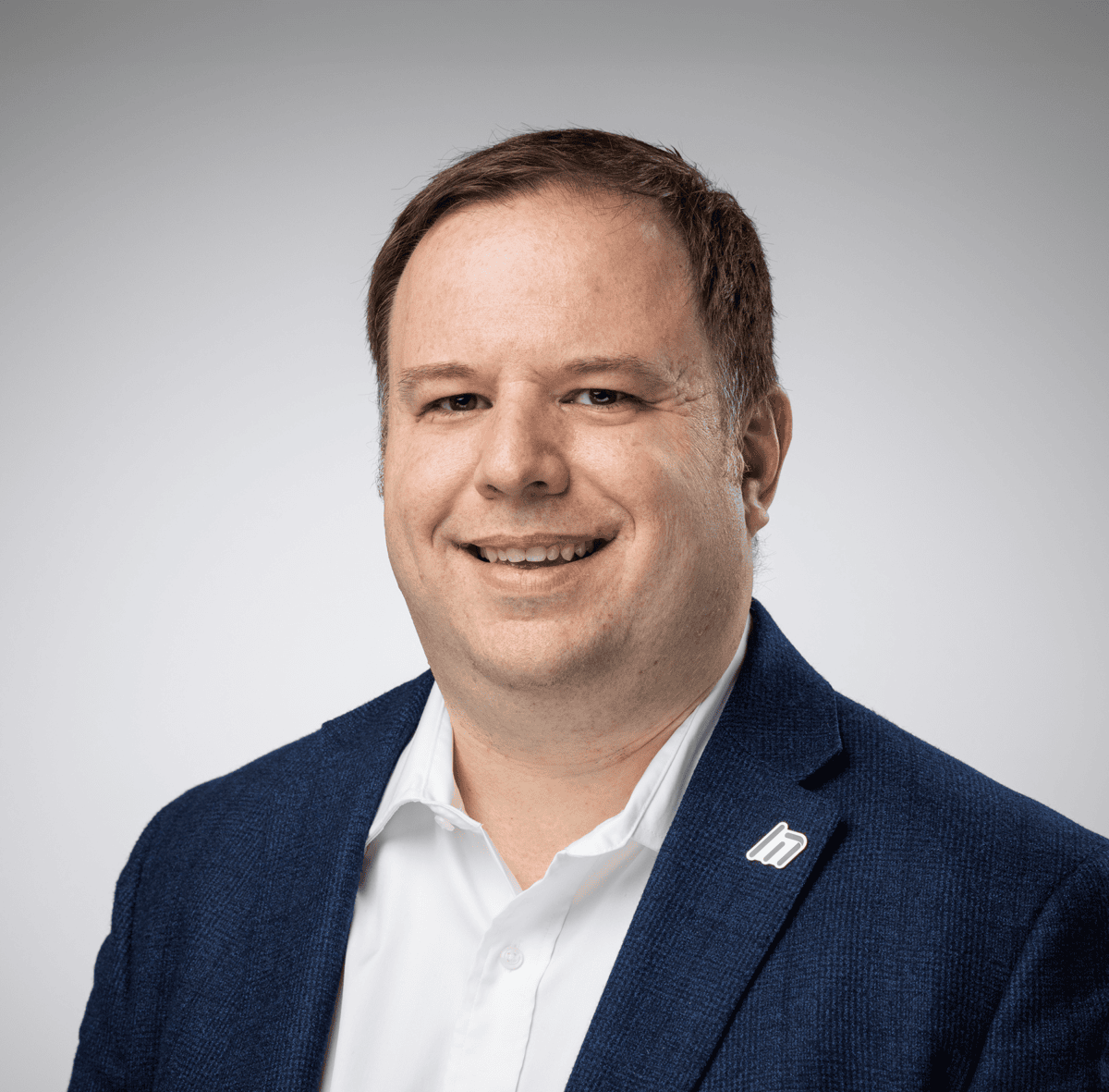 Headshot of Andrew Volkening